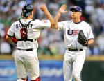 Brad Lidge celebrates with catcher Michael Barrett after closing out the win over Mexico.