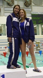 Irish Win Three Events, Seize Lead At BIG EAST Championships Sophomores and roommates Katie Carroll (left) and Jessica Stephens atop the podium after taking first and second in the 200-yard individual medley to hand Notre Dame the team lead at the BIG EAST Championships.