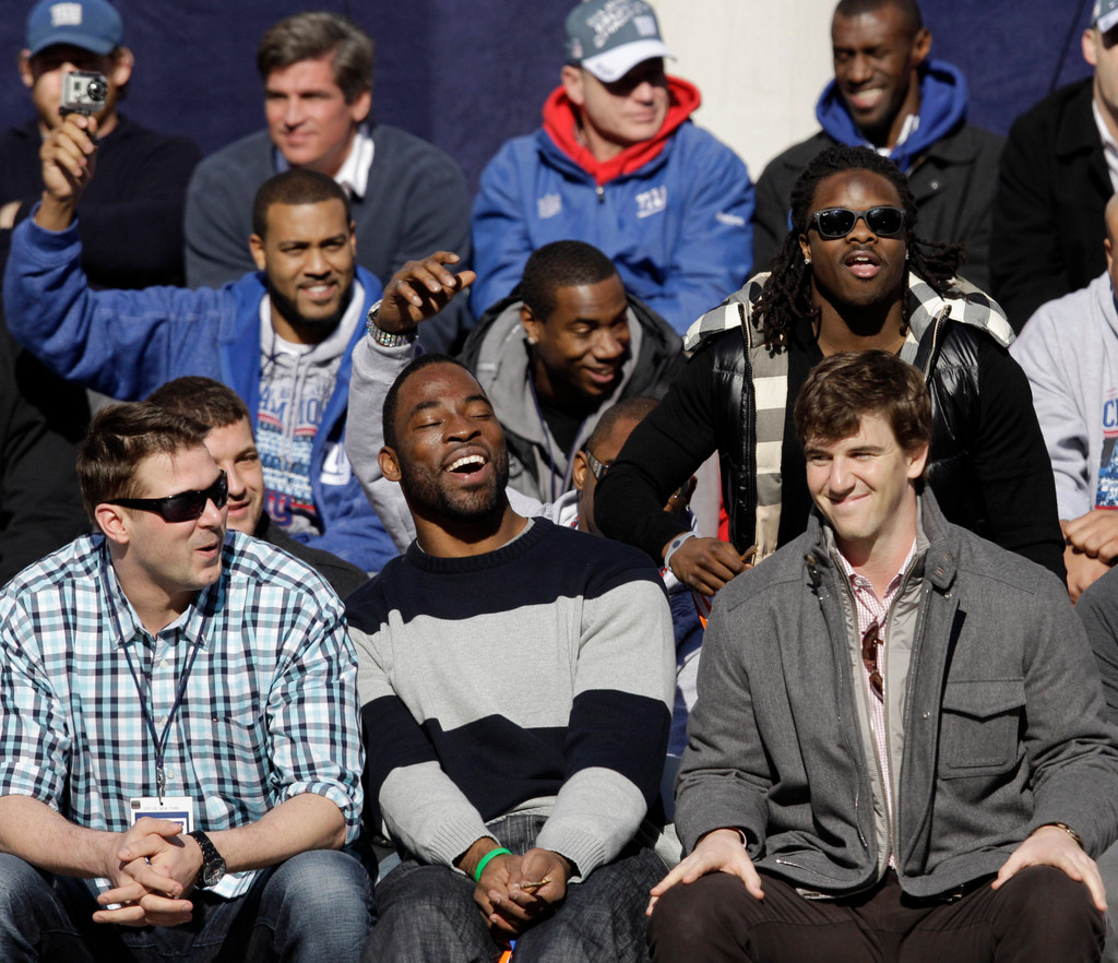 Justin Tuck & Sergio Brown at Super Bowl XLVI (AP)