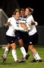 Three Irish Players On Preseason Watch List For 2005 M.A.C. Hermann Trophy (from left) Katie Thorlakson, Candace Chapman and Jen Buczkowski - pictured during the 2004 NCAA title season - each collected NSCAA All-America honors for the second time in their careers while joining freshman Kerri Hanks to form a group of four Irish players on the 2005 NSCAA All-America teams.