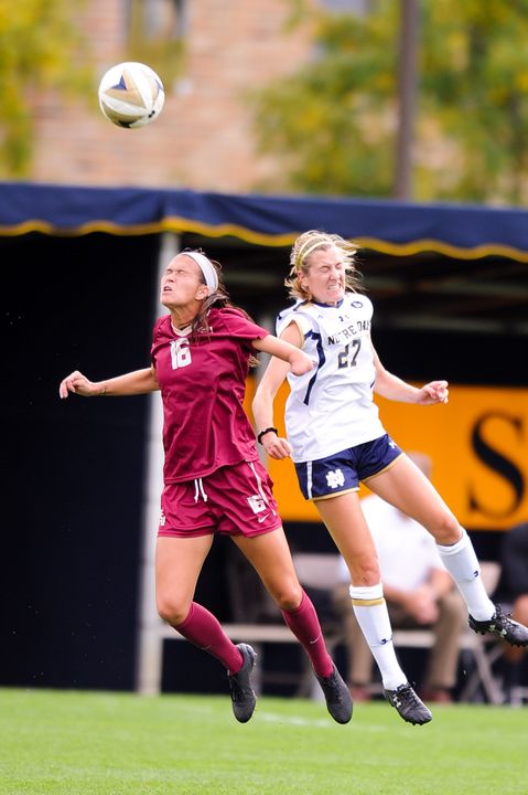 Junior forward Kaleigh Olmsted goes up for a header against FSU's Carson Pickett on Sunday.