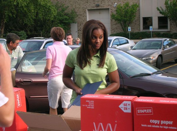 New Irish assistant coach Niele Ivey lends a hand during WNDU-TV's '16 Pack-A-Backpack' event earlier this month.
