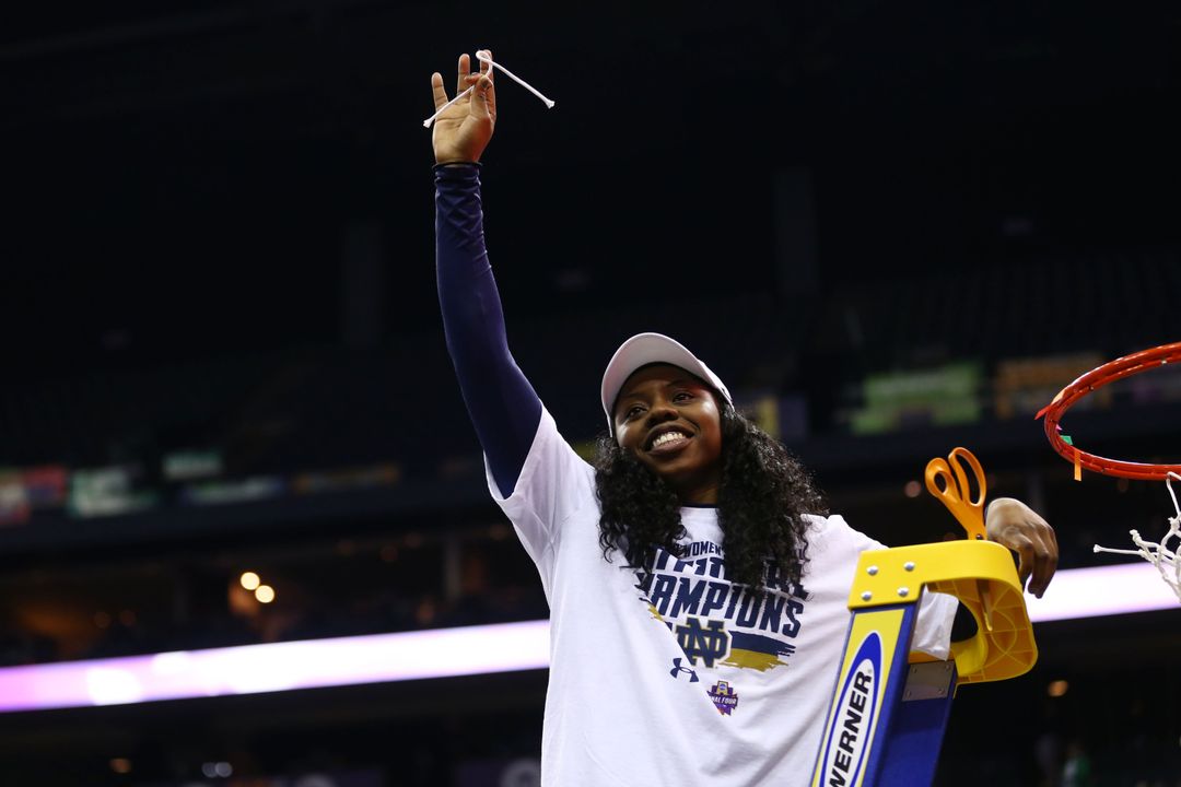 Apr 1, 2018; Columbus, OH, USA; Notre Dame Fighting Irish guard Arike Ogunbowale (24) holds a piece of the net as she helps cut down the net after defeating the Mississippi State Lady Bulldogs in the championship game of the women's Final Four in the 2018 NCAA Tournament at Nationwide Arena. Notre Dame won 61-58. Mandatory Credit: Aaron Doster-USA TODAY Sports