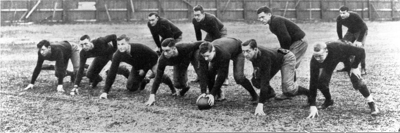 Long before he became the greatest head coach in college football history, Knute Rockne was an All-America end for the Fighting Irish and helped revolutionize the game with the use of the forward pass in 1913.