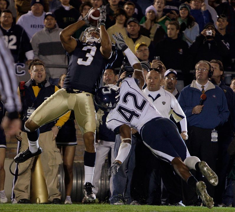 Michael Floyd nabs a touchdown pass in overtime in Notre Dame's loss to Connecticut.