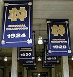 Banners commemorating Notre Dame's 11 consensus titles run the length of the tunnel leading to the field from the visitor and home team locker rooms.