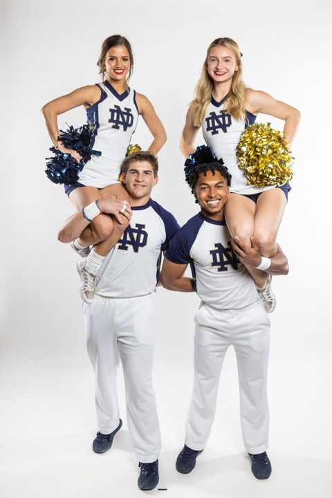 Notre Dame cheerleading squad and mascot practicing before