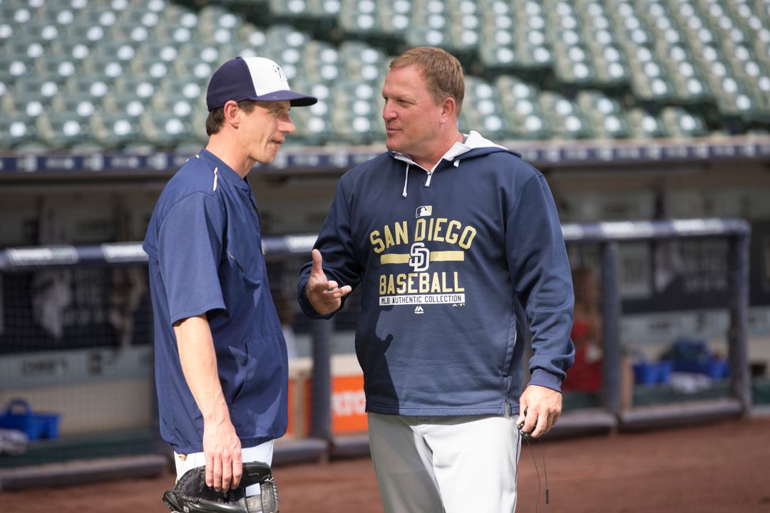 Craig Counsell (left) and Pat Murphy (right) chat before their game August 4, 2015.