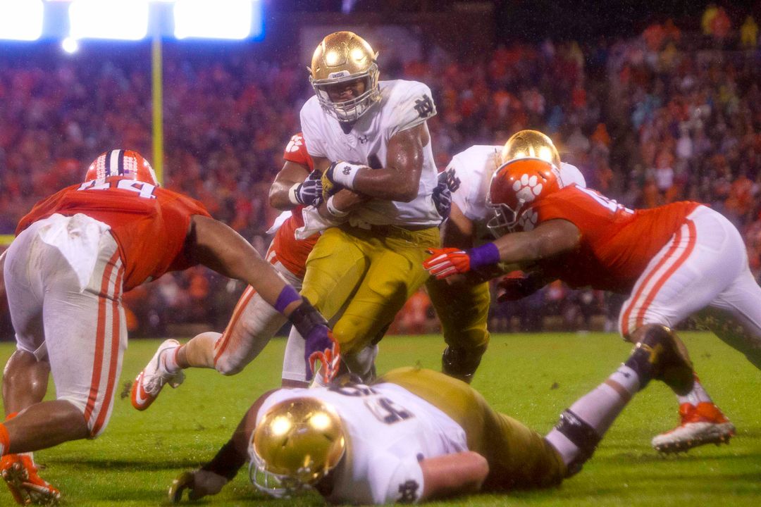 Notre Dame Fighting Irish quarterback DeShone Kizer (14) scores a touchdown during the second half against the Clemson Tigers at Clemson Memorial Stadium. Tigers won 24-22. Credit: Joshua S. Kelly-USA TODAY Sports