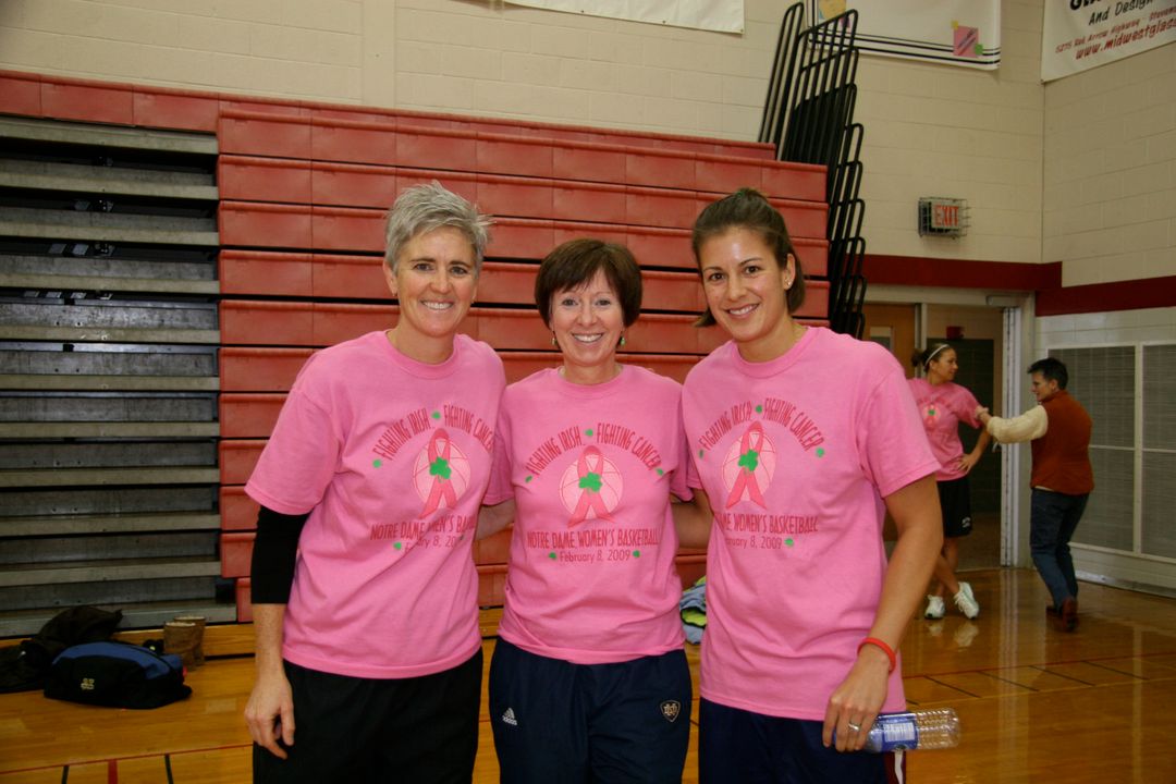 Head coach Muffet McGraw (center) and the Irish conducted a basketball clinic in January in Stevensville, Mich., as part of their efforts in support of the WBCA Pink Zone this year. The Irish raised more than $45,000 for the initiative and were named the winners of the inaugural WBCA Pink Zone Challenge, it was announced last Friday.