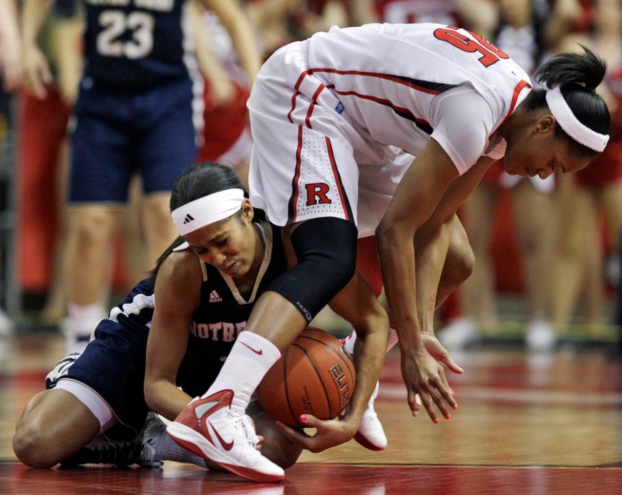 Notre Dame's Skylar Diggins makes a steal from the bottom as Rutgers' Briyona Canty can't hold on.