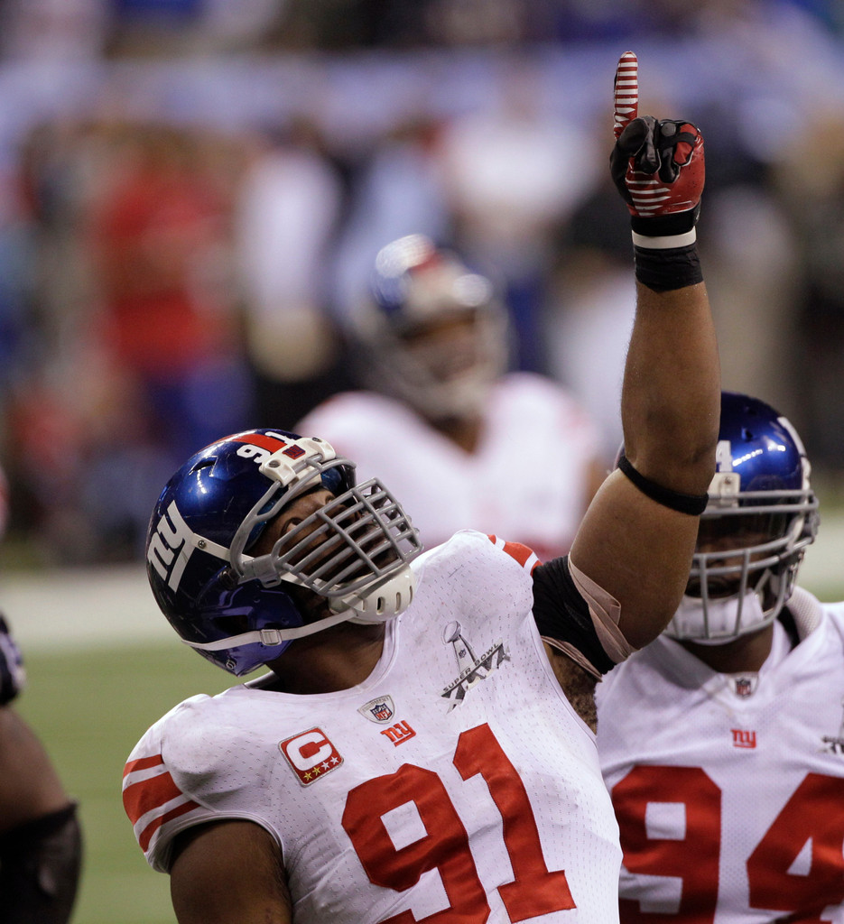 Justin Tuck & Sergio Brown at Super Bowl XLVI (AP)