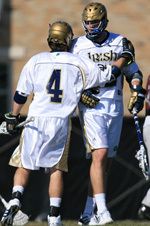 Bill Liva (left) congratulates Will Yeatman (right) after he scored one of his three goals against Bellarmine in an 11-3 Irish victory on March 20.