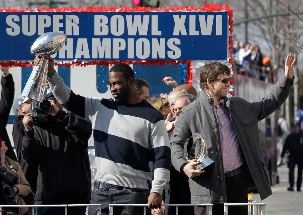 Justin Tuck & Sergio Brown at Super Bowl XLVI (AP)
