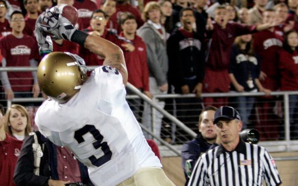 Michael Floyd catches a touchdown pass in front of Stanford's Richard Sherman in last year's meeting with the Cardinal.