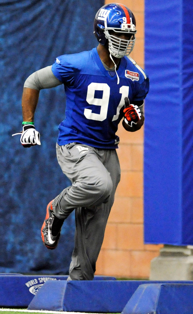 Justin Tuck & Sergio Brown at Super Bowl XLVI (AP)