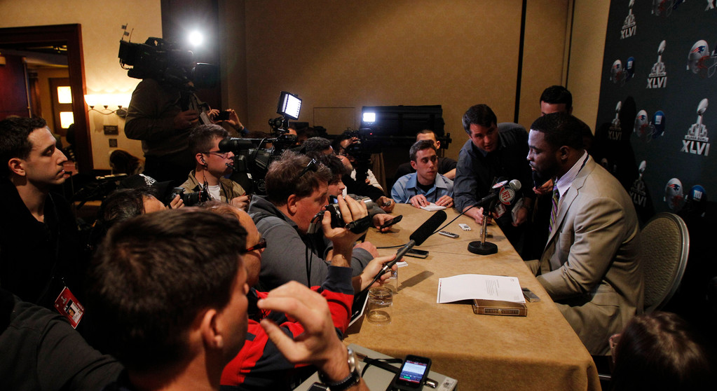 Justin Tuck & Sergio Brown at Super Bowl XLVI (AP)