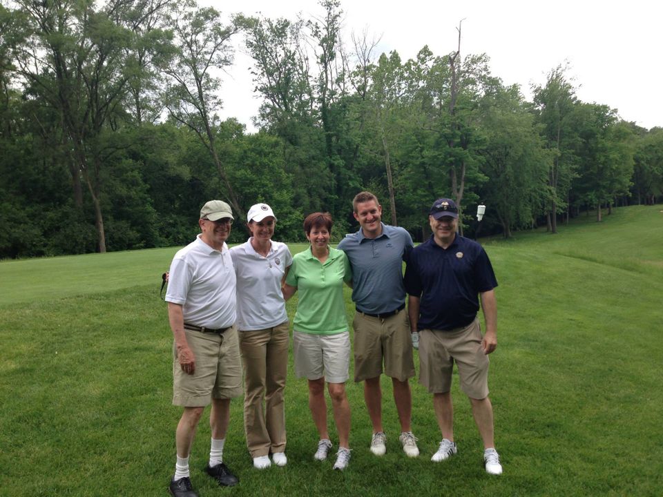Honorary Monogram winner and women's basketball head coach Muffet McGraw (center) took photos with each of the foursomes.