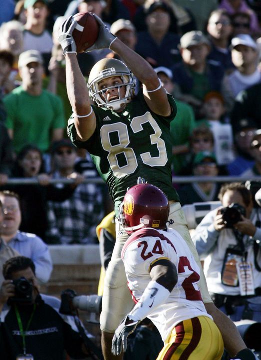 Jeff Samardzija, shown here making his ninth touchdown catch of the season against USC, has caught at least one scoring toss in all six games this season - matching Malcolm Johnson's school-record set in 1998.