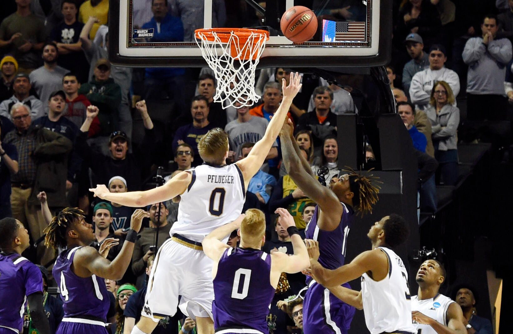 Pflueger Tip Gives Notre Dame 76-75 Win Over Stephen F. Austin Rex Pflueger (0) tips in the winning basket against the Stephen F. Austin Lumberjacks during the second half in the second round of the 2016 NCAA Tournament at Barclays Center. Credit: Robert Deutsch-USA TODAY Sports