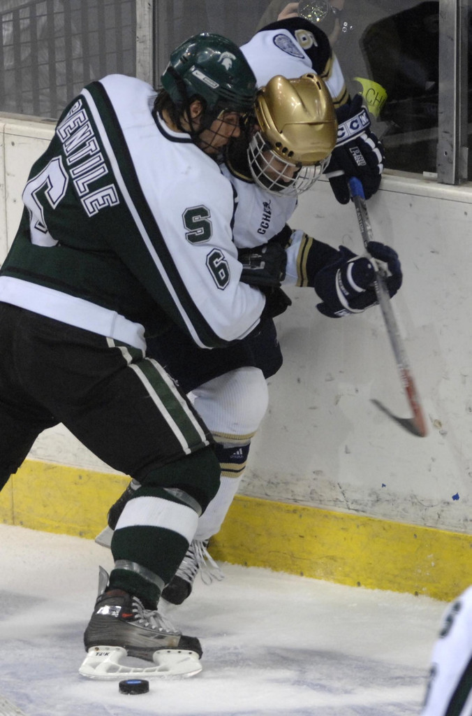 NCAA Quarterfinals - Notre Dame vs. Michigan State (AP photos)