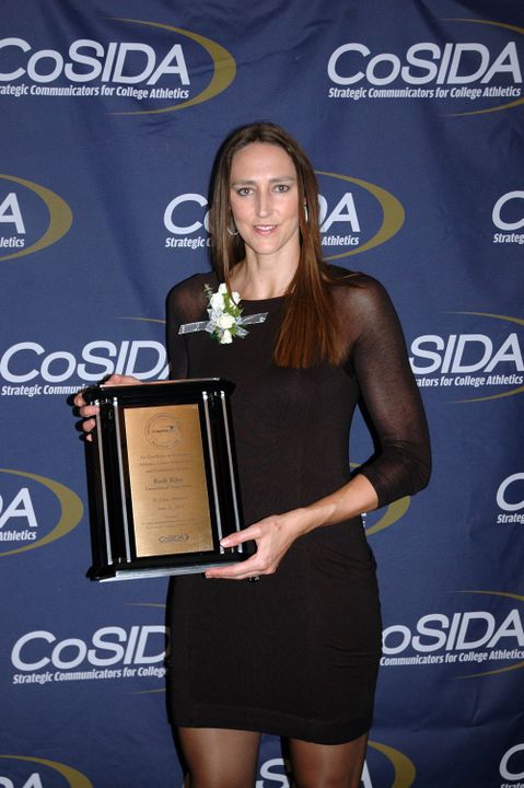 Ruth Riley ('01) holds the plaque signifying her induction into the Capital One Academic All-America Hall of Fame Monday night in St. Louis.