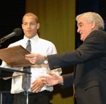 Former Monogram Club president - and current advisor - Marty Allen presents the 2005 Monogram Club MVP Award for the Notre Dame men's basketball team to senior point guard Chris Thomas.
