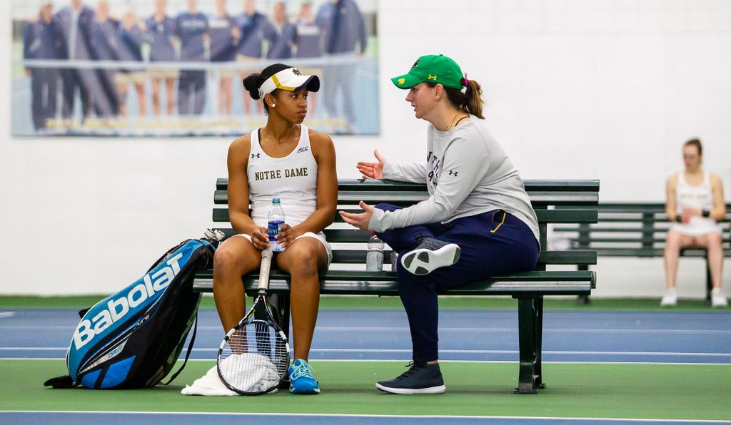 Zoe Spence (left) and head coach Alison Silverio during the ACC match between University of Notre Dame vs. University of Louisville at Eck Center on March 8, 2019 in South Bend, Indiana.