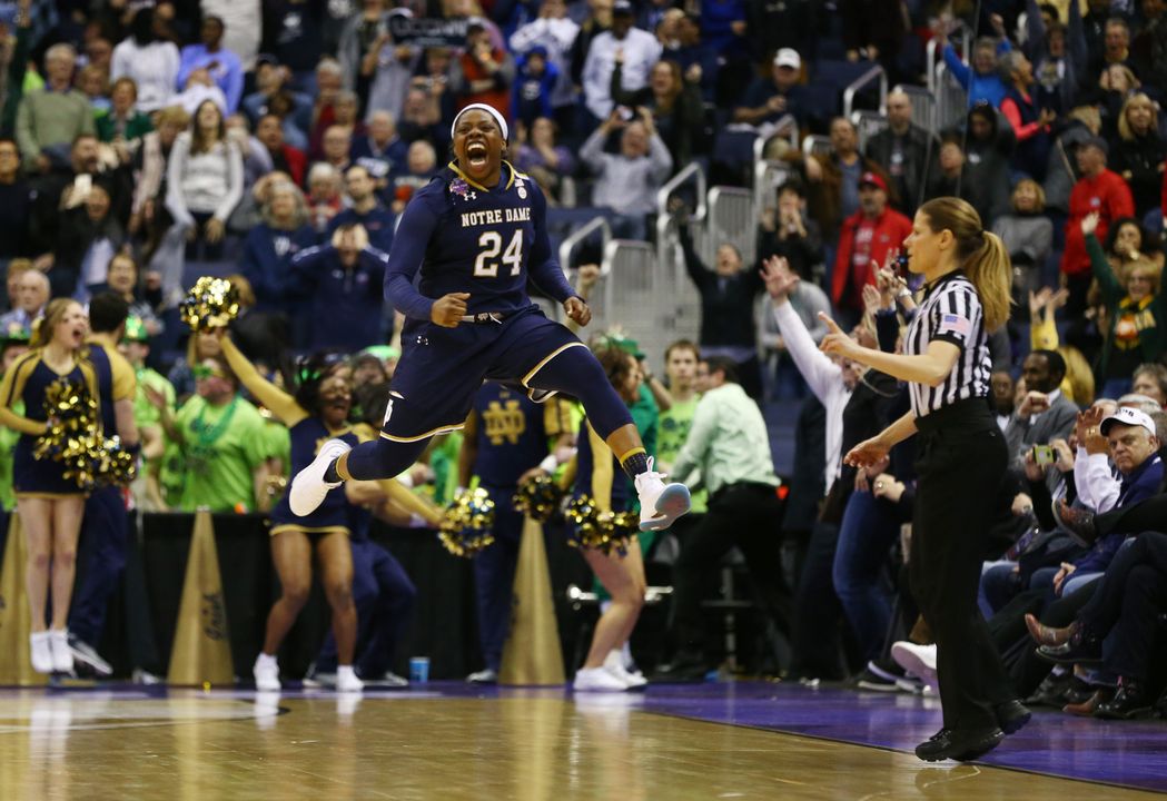 Mar 30, 2018; Columbus, OH, USA; Notre Dame Fighting Irish guard Arike Ogunbowale (24) reacts after hitting the game winning shot against the Connecticut Huskies in overtime in the semifinals of the women's Final Four in the 2018 NCAA Tournament at Nationwide Arena. Mandatory Credit: Aaron Doster-USA TODAY Sports