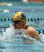 Senior Tim Randolph snapped his own school record in the 100-yard breast with a time of 54.86 on Friday morning.