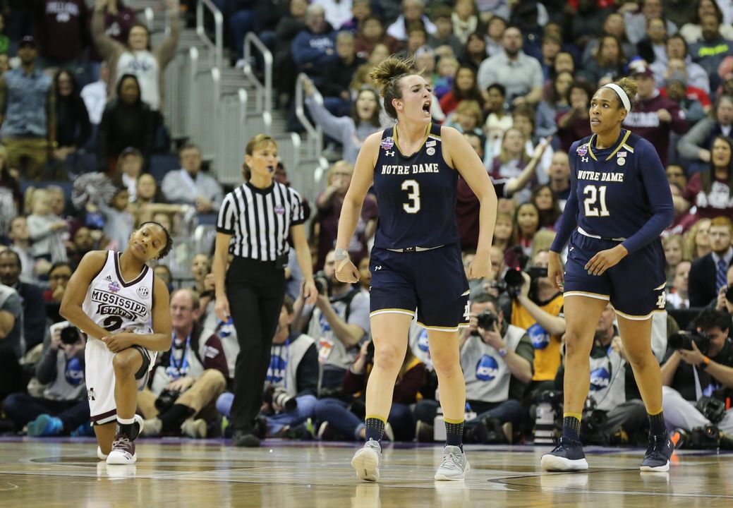Apr 1, 2018; Columbus, OH, USA; Notre Dame Fighting Irish guard Marina Mabrey (3) yells as Mississippi State Lady Bulldogs guard Morgan William (2) and Notre Dame forward Kristina Nelson (21) react during the third quarter in the championship game of the women's Final Four in the 2018 NCAA Tournament at Nationwide Arena. Mandatory Credit: Joe Maiorana-USA TODAY Sports