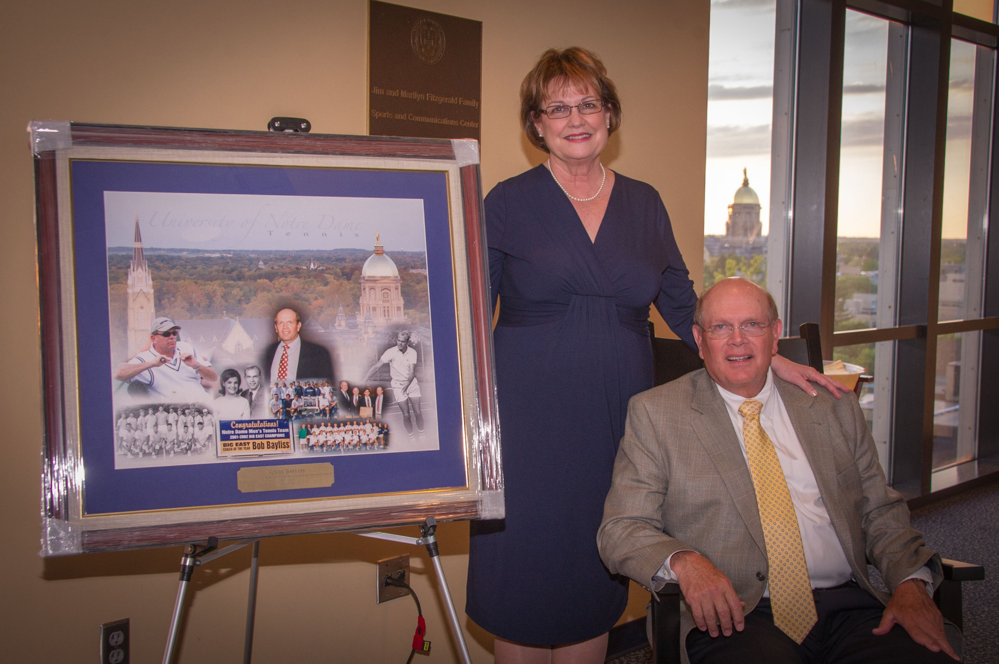 Game, Set, Match Bobby Bayliss (here with wife, Pat) was honored last Friday with a retirement party in the football press box.