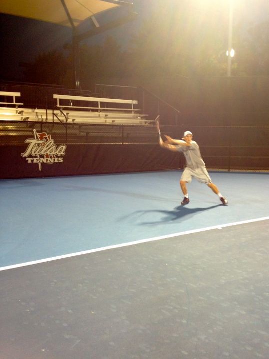 Sophomore Eric Schnurrenberger playing in in the prequalifying round of the ITA All-American National Championships. Photo taken by assistant coach Adam Schaechterle.