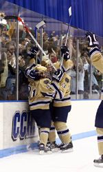 The Irish celebrate Kevin Deeth's third-period goal with 2:17 left that gave Notre Dame a 2-2 tie with Miami.