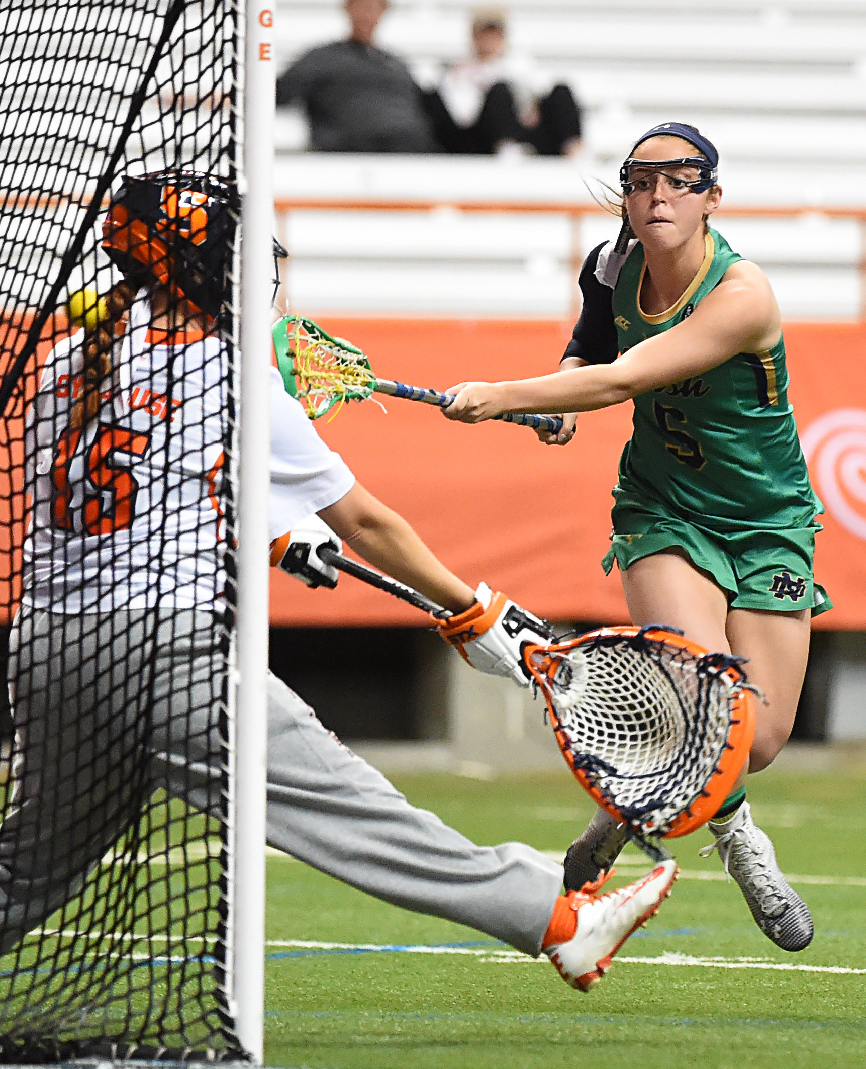 No. 13 Notre Dame Downs No. 7 Syracuse, 12-11 in OT Rachel Sexton scores one of her three goals.