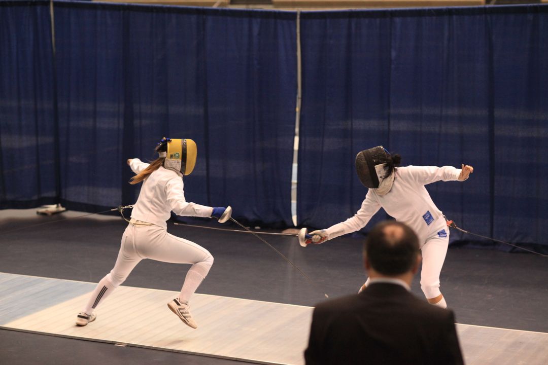 Nicole Ameli (left) won the first-ever ACC women's epee title Sunday, beating teammate and co-captain Ashley Severson.