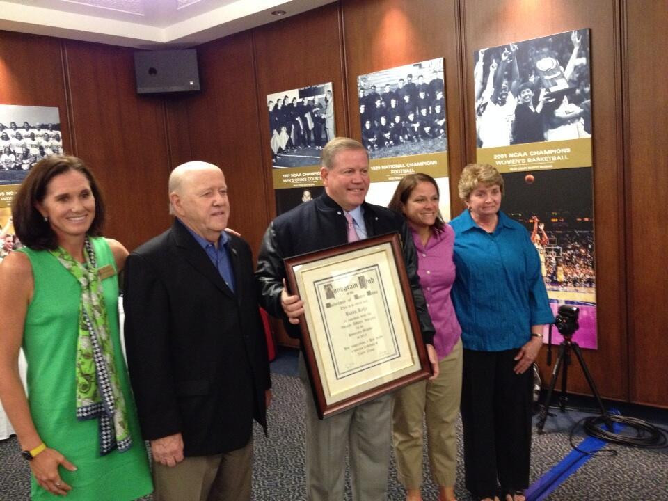 Notre Dame Football Coach Brian Kelly Awarded Honorary Monogram The Monogram Club awarded a surprise honorary Monogram to Irish football head coach Brian Kelly at the Club's Fall Board Meeting on Friday.