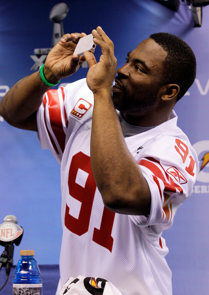 Justin Tuck & Sergio Brown at Super Bowl XLVI (AP)