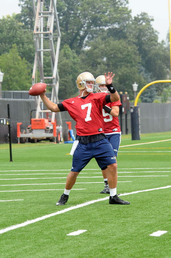 Football Practice Update – Sunday, Aug. 9 Jimmy Clausen warms up his arm at the beginning of practice on Sunday, August 9, 2009.