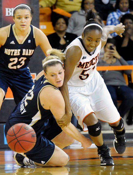 Brittany Mallory battles for a loose ball.