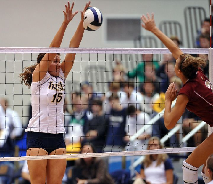 Sophomore Kristen Dealy gets a hand on an Denver attack Friday as Notre Dame cruised to a 3-0 win. The Irish had six team blocks on the evening.