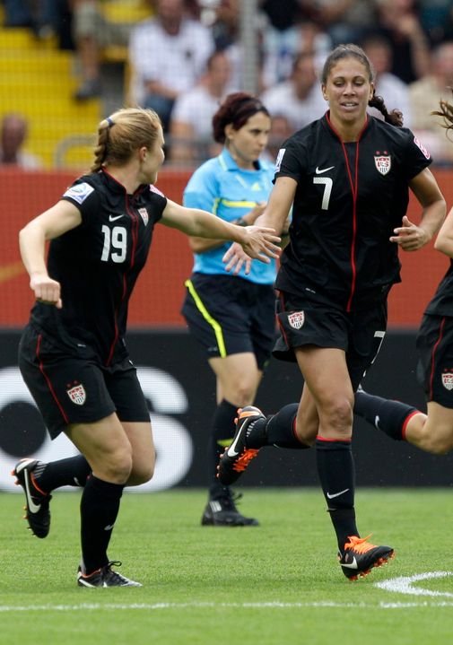 Former Notre Dame women's soccer midfielder Shannon Boxx (#7, at right) is congratulated by fellow U.S. National Team member Rachel Buehler after Boxx's cross led to an own-goal in the second minute of the Americans' epic World Cup quarterfinal win over Brazil on July 10 in Dresden, Germany.