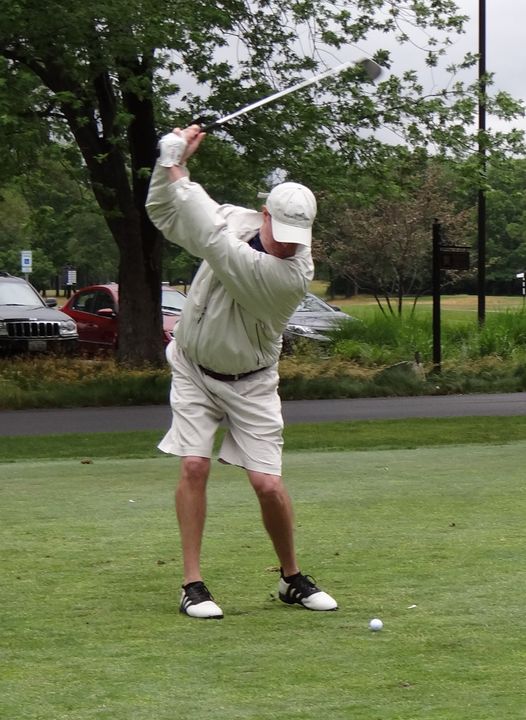Monogram Club second vice president Kevin O'Connor tees off on the par 3 9th hole at the 2012 Riehle Open.