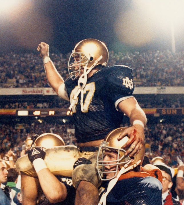 Senior linebacker Ned Bolcar is carried off the field following Notre Dame's 34-21 win over West Virginia in the 1989 Fiesta Bowl that gave the Irish their first national championship since 1977.