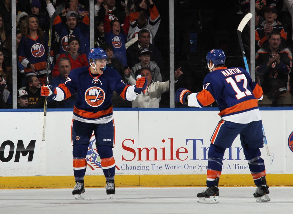 Anders Lee celebrates his first NHL goal as a member of the New York Islanders.