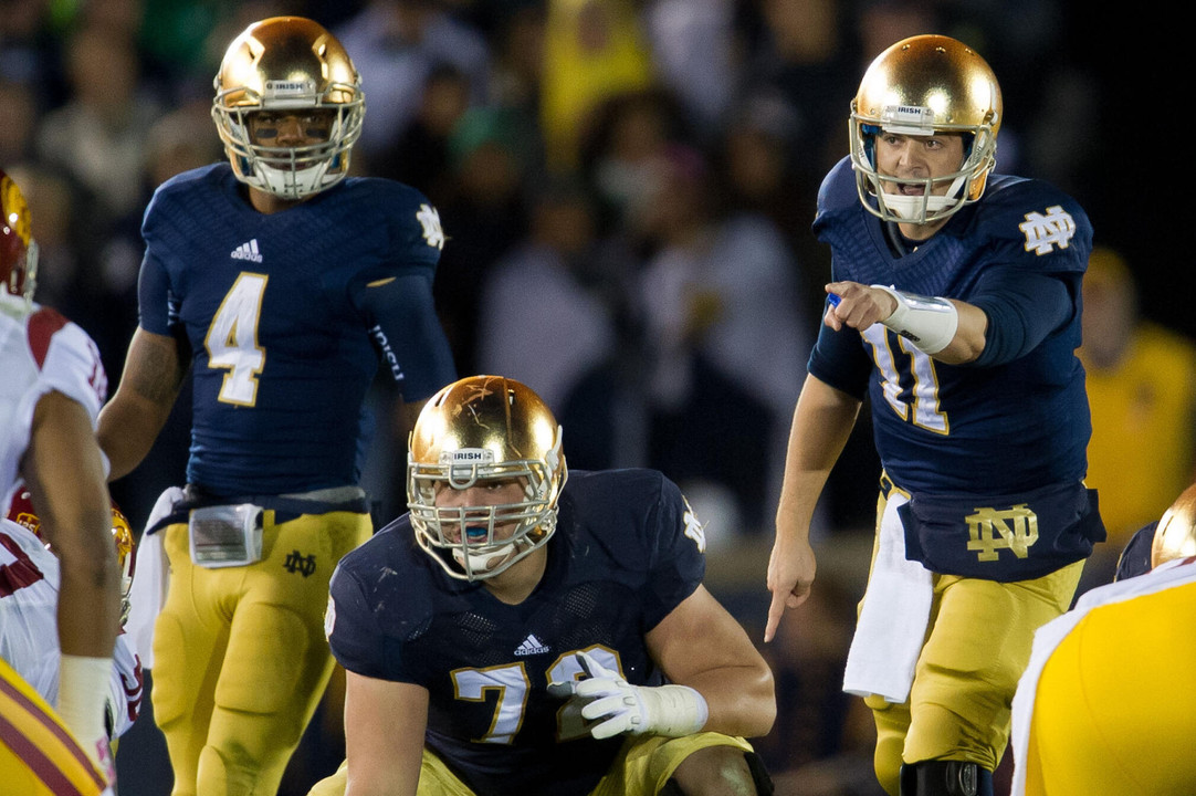 Tommy Rees threw a pair of touchdowns before leaving the game with a strained neck.