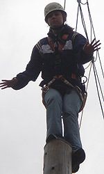 Ellen Heintzman atop the 30-foot pole on the ropes course on Pohorje Mountain.