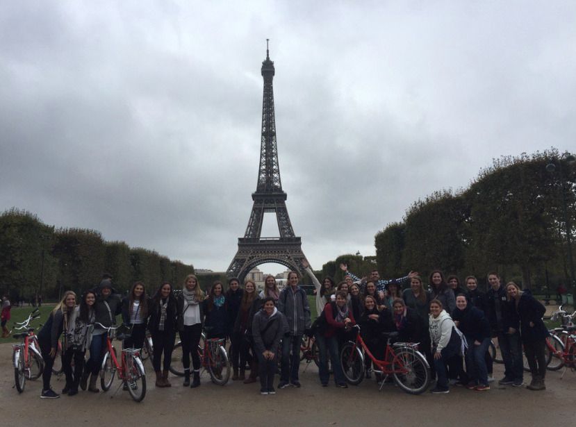 The Monogram Club funded the softball team's bike tour of Paris during its European trip in October.