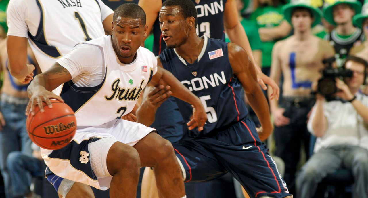 Notre Dame guard Tory Jackson, left, attempts to drive around Connecticut guard Kemba Walker in the first half of an NCAA college basketball game Wednesday, March 3, 2010, in South Bend, Ind. (AP Photo/Joe Raymond)