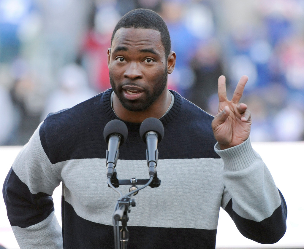 Justin Tuck & Sergio Brown at Super Bowl XLVI (AP)